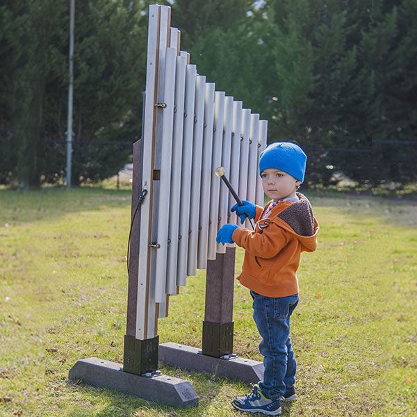 freestanding griffin playground equipment and musical play equipment