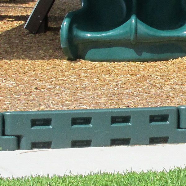 green 12 inch plastic playground border with spike close view