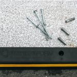 engineered traffic curb hardware